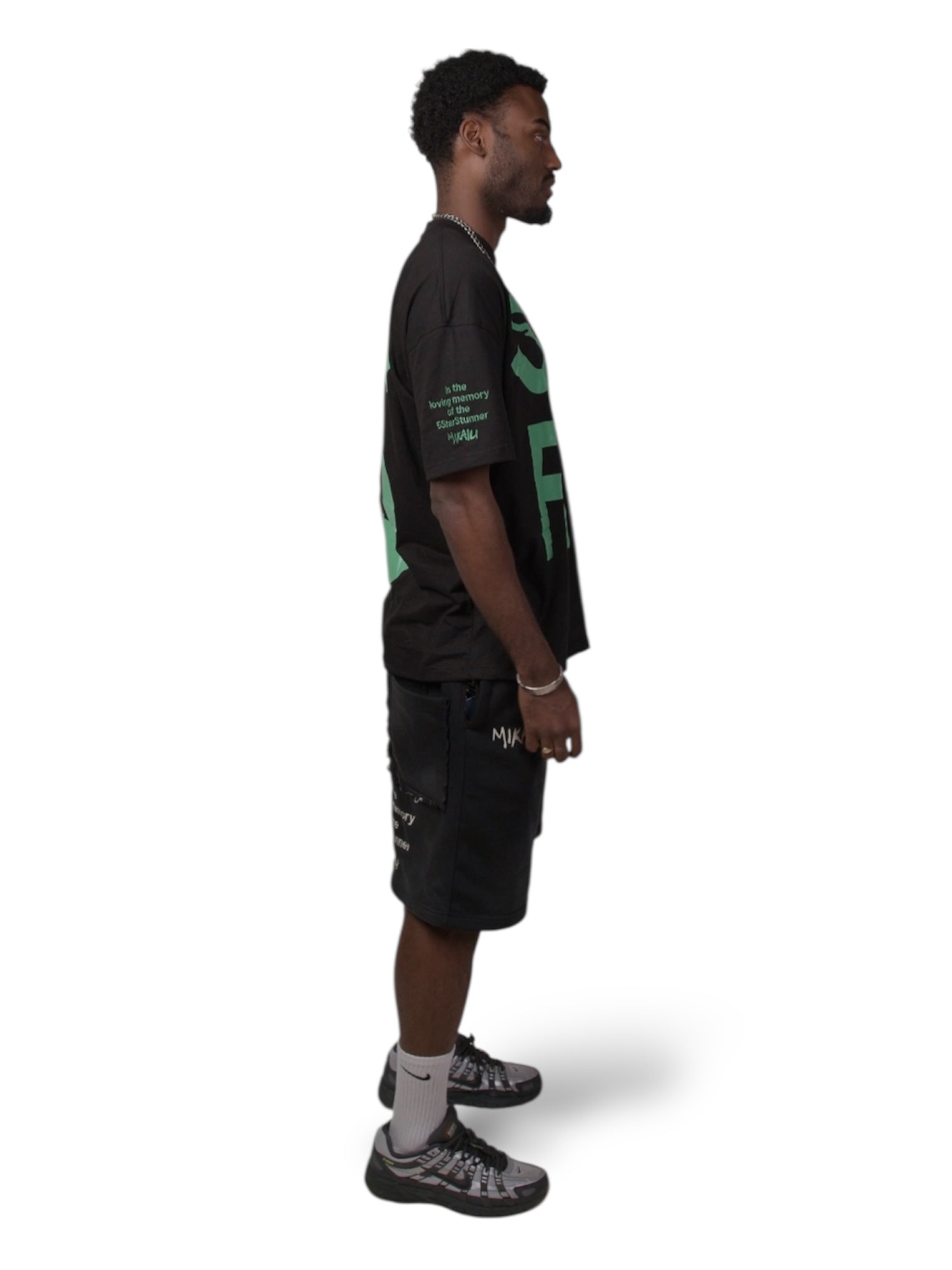 SUCKAFREE BLACK T-SHIRT GREEN PRINT