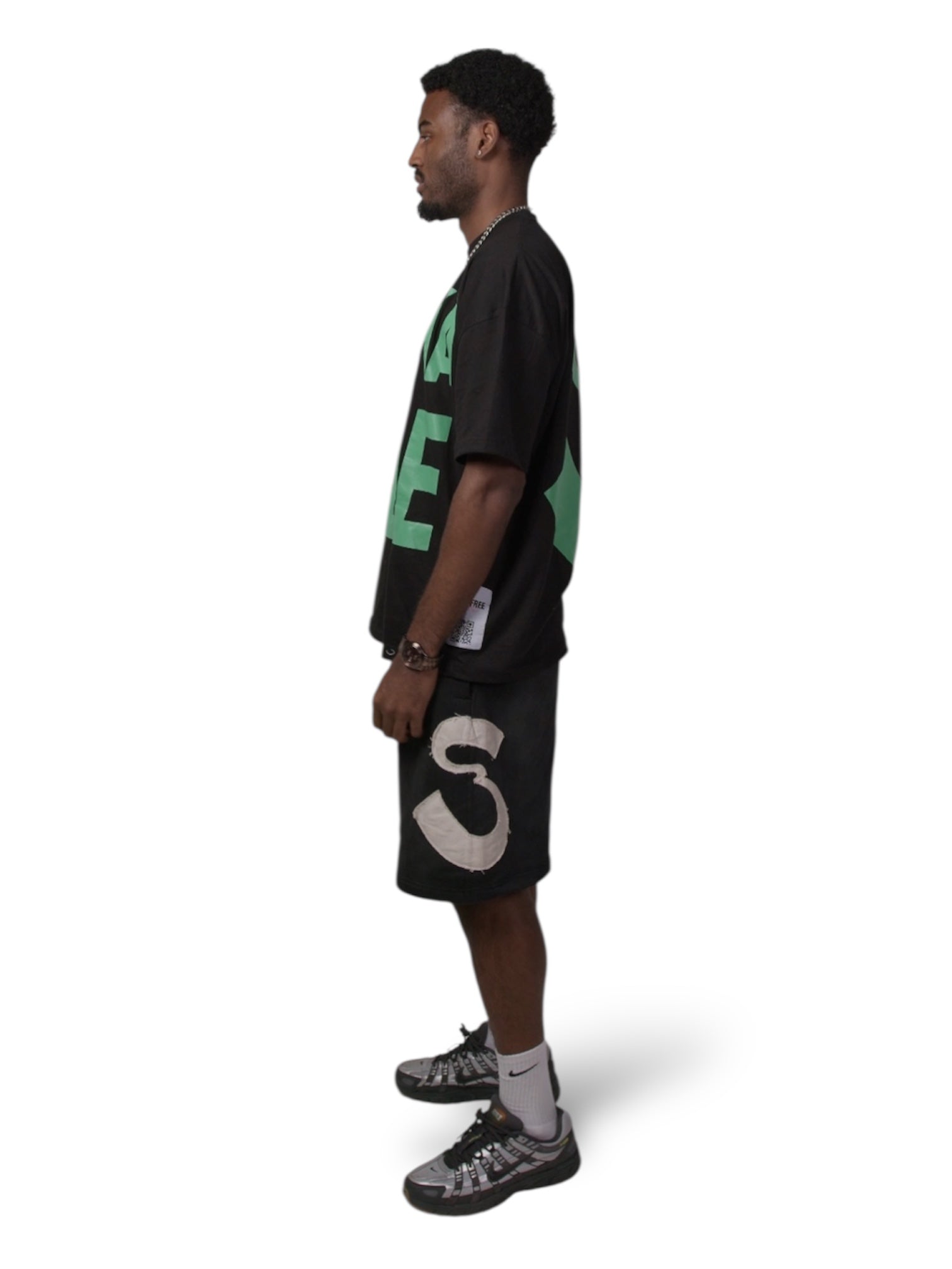 SUCKAFREE BLACK T-SHIRT GREEN PRINT